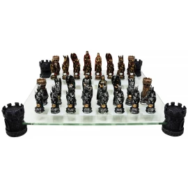 Chess pieces King Arthur, gold-silver pieces with glass chess board